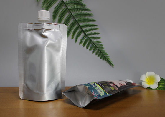 Sacs d'emballage de Doypack stratifiés par poignée faite sur commande avec le bec pour le jus liquide