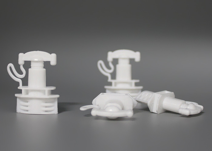 Petite torsion de calibre outre des chapeaux en plastique de bec pour l'étanchéité élevée de poche crème portative