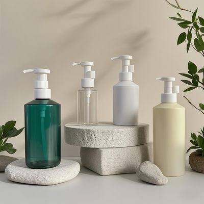 Bouteille de pompe à lotion en forme de cylindre en PET de 300 ml à 500 ml pour emballage cosmétique avec impression de logo personnalisable