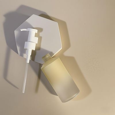 Bouteille de pompe à lotion en forme de cylindre en PET de 300 ml à 500 ml pour emballage cosmétique avec impression de logo personnalisable