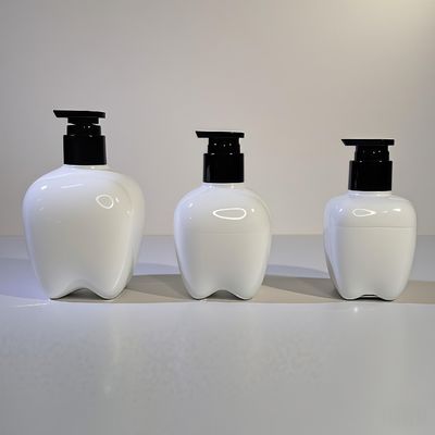 Bouteille en plastique en forme de dent de 100 à 250 ml avec pompe à pression pour le lavage des mains, lotion capillaire, désinfectant pour les mains, logo personnalisable
