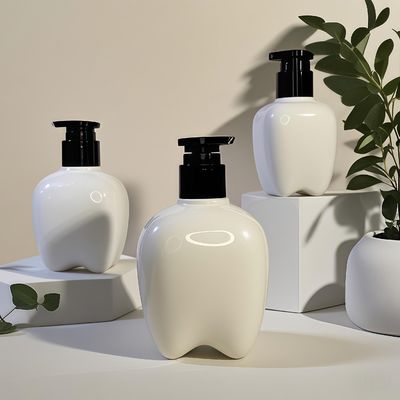 Bouteille en plastique en forme de dent de 100 à 250 ml avec pompe à pression pour le lavage des mains, lotion capillaire, désinfectant pour les mains, logo personnalisable